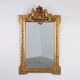 French rococo style richly sculpted gilted oak mirror, 19th century