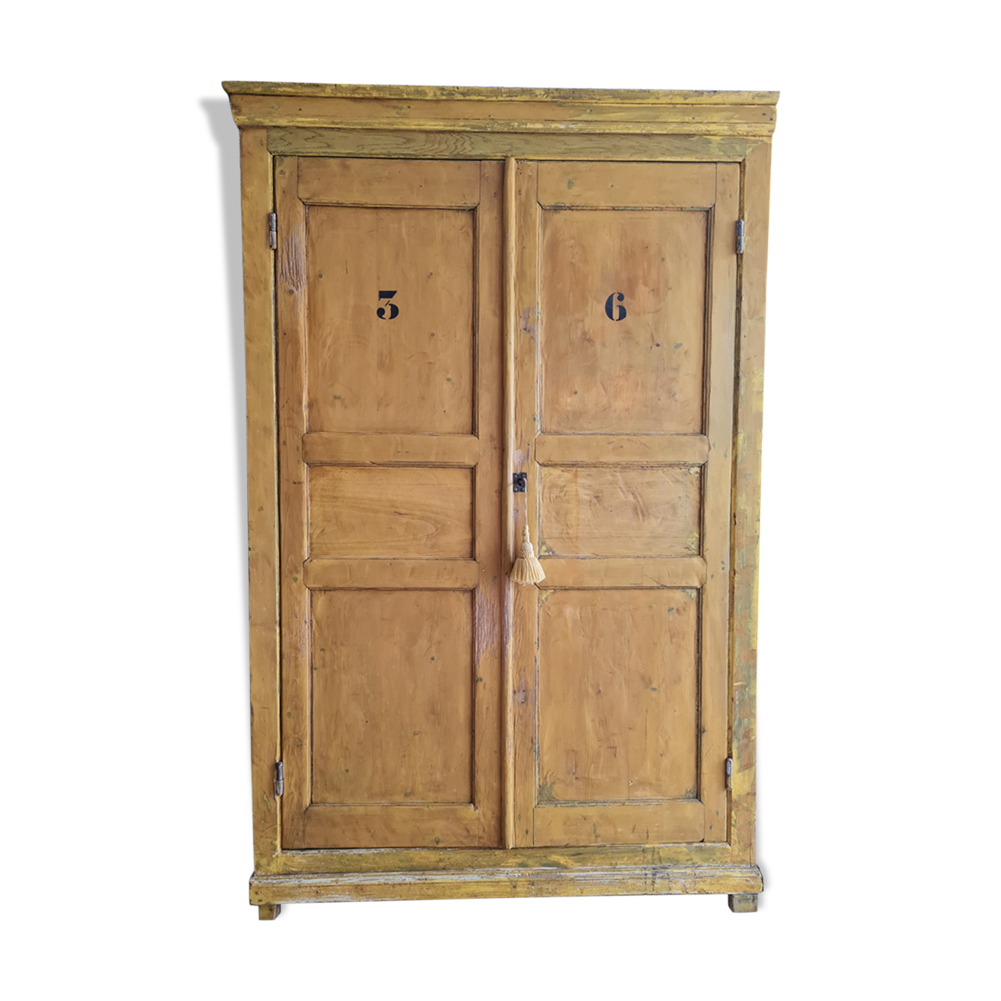 Mustard yellow patinated cabinet