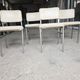 4 chrome metal chairs with faux leather from the 1970s.