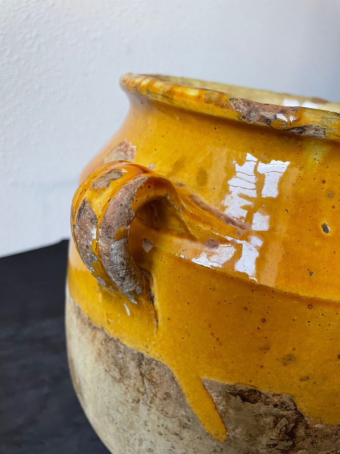 Old yellow glazed terracotta grease pot south west France