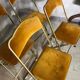 Quatre chaises pliantes velours et laiton