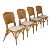 Suite de 4 chaises en rotin et tissu écru – esprit Riviera / années 1970
