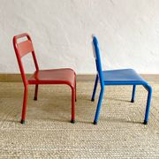Pair of Mullca nursery chairs in metal and wood painted red and blue