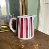 Old striped milk jug