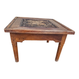 Table basse sculptée