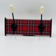 Vintage red Scottish coat rack from the 1970s.