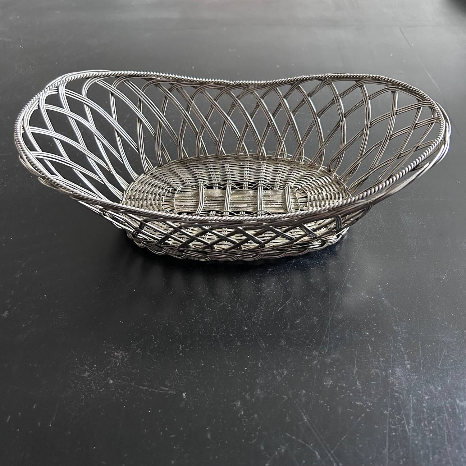 Silver woven metal basket