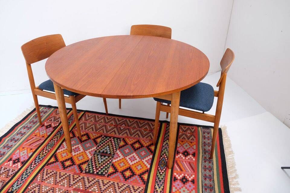 1960s/70s-style teak dining table by ASKO, with a retro vintage design.