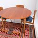 1960s/70s-style teak dining table by ASKO, with a retro vintage design.