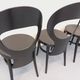 Set of 4 vintage Mouette chairs by Baumann in black wood from the 1960s.