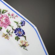 4 flat plates by Bernardaud, Limoges porcelain, floral decoration from the 1920s to 1950s.