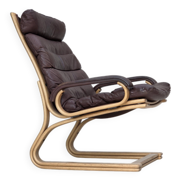 Fauteuil danois des années 1970 par Georg Thams, cuir de meuble, bois cintré.