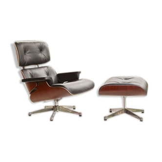 Lounge chair and ottoman by Charles & Ray Eames 1956