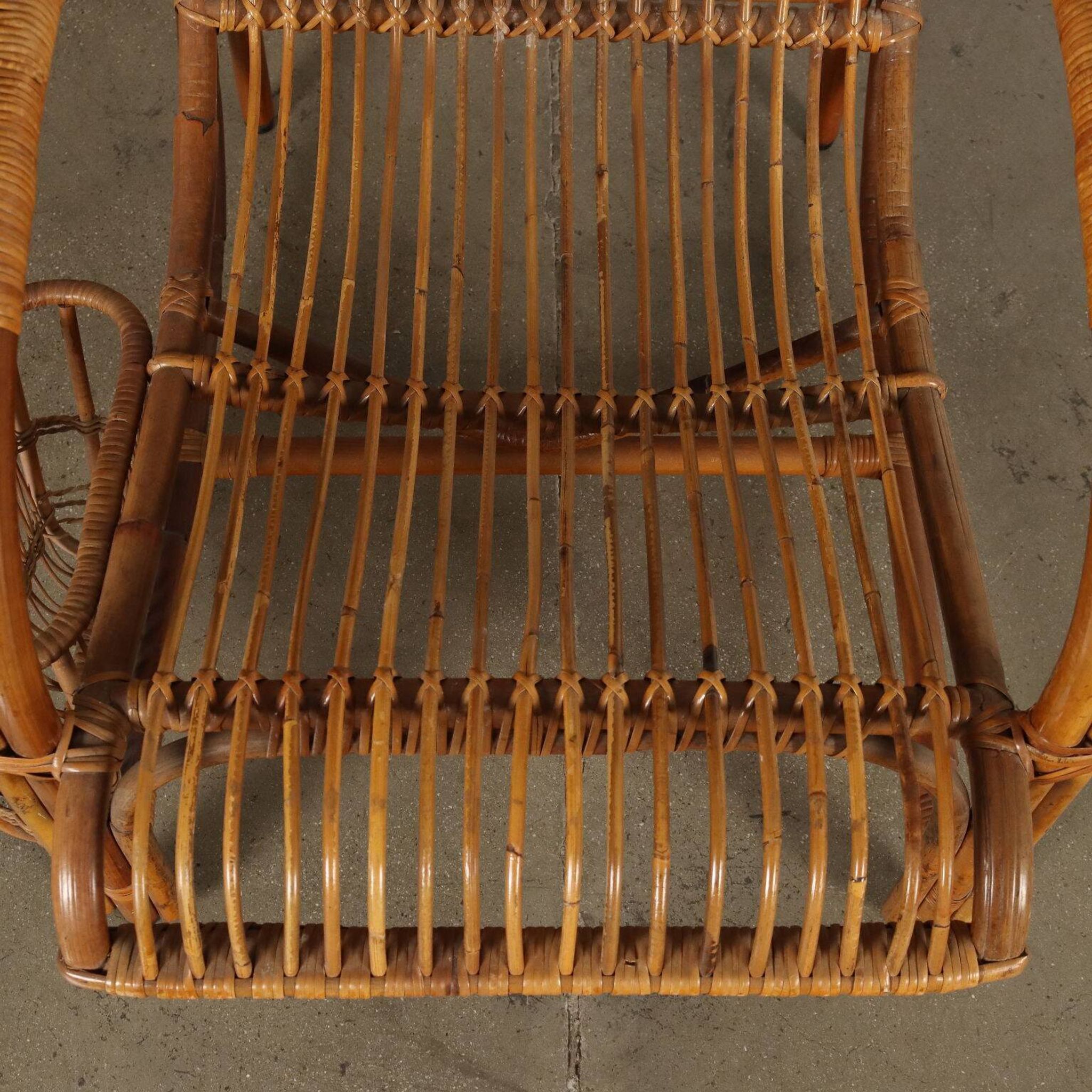 Vintage wicker armchair with magazine rack, Italy, 1960s
