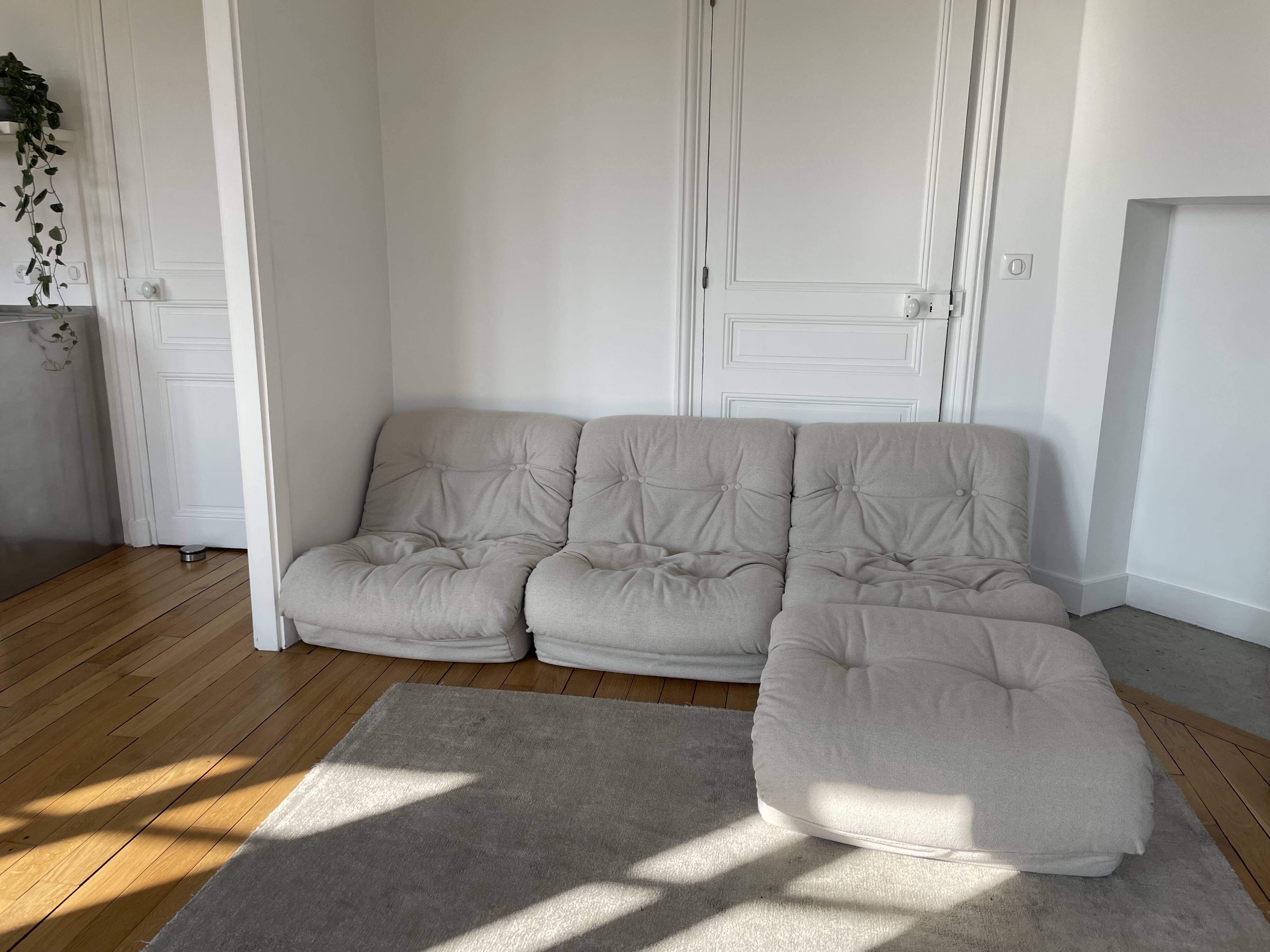 Modular sofa with 3 armchairs and an ottoman.