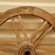 Old teak plow wheel