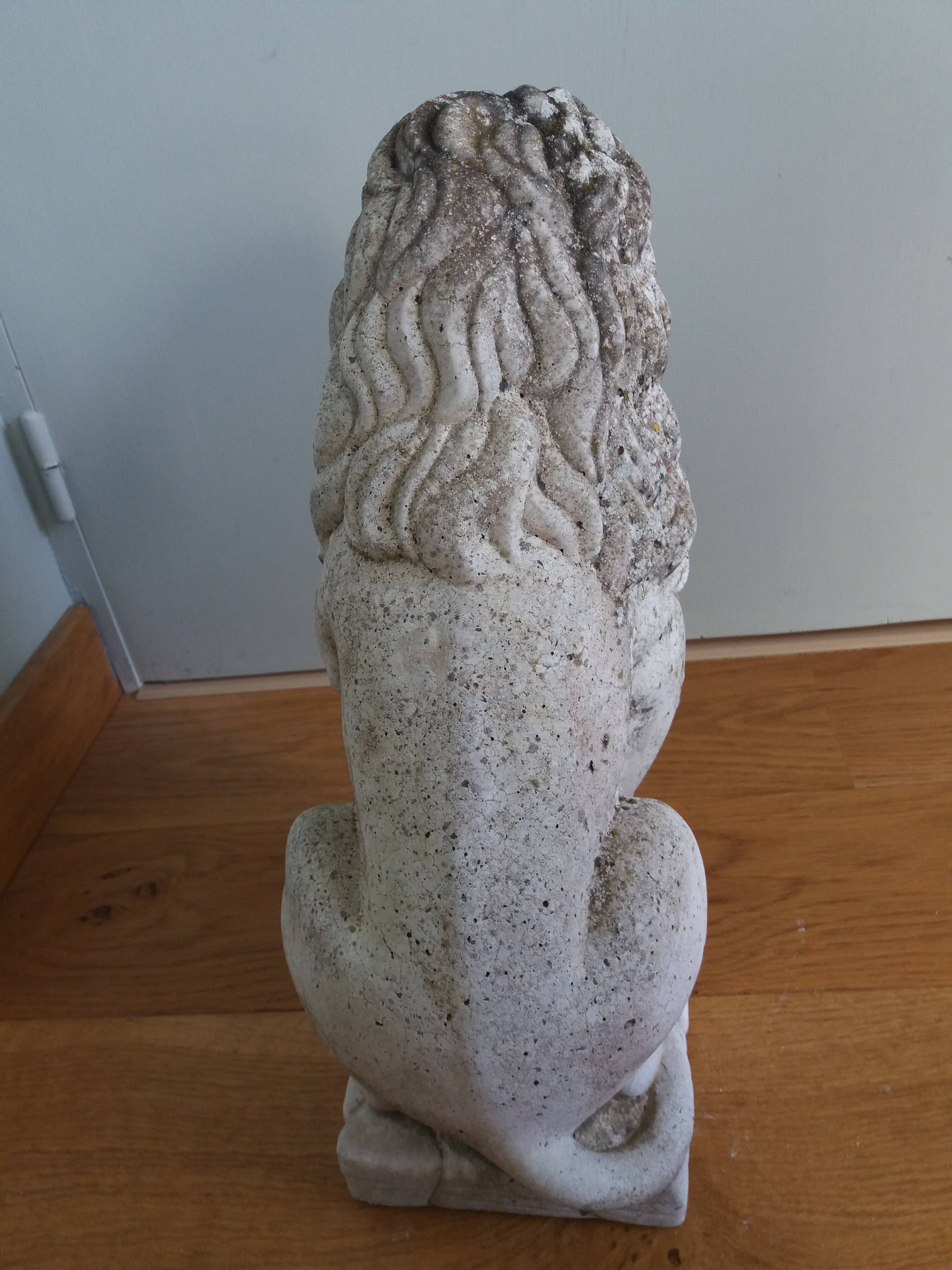 Lion garden statue in reconstituted stone