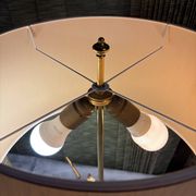 Bronze and travertine water lily lamp attributed to Maison Charles, circa 1970.