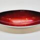 Designer bowl centerpiece in iridescent red enameled metal