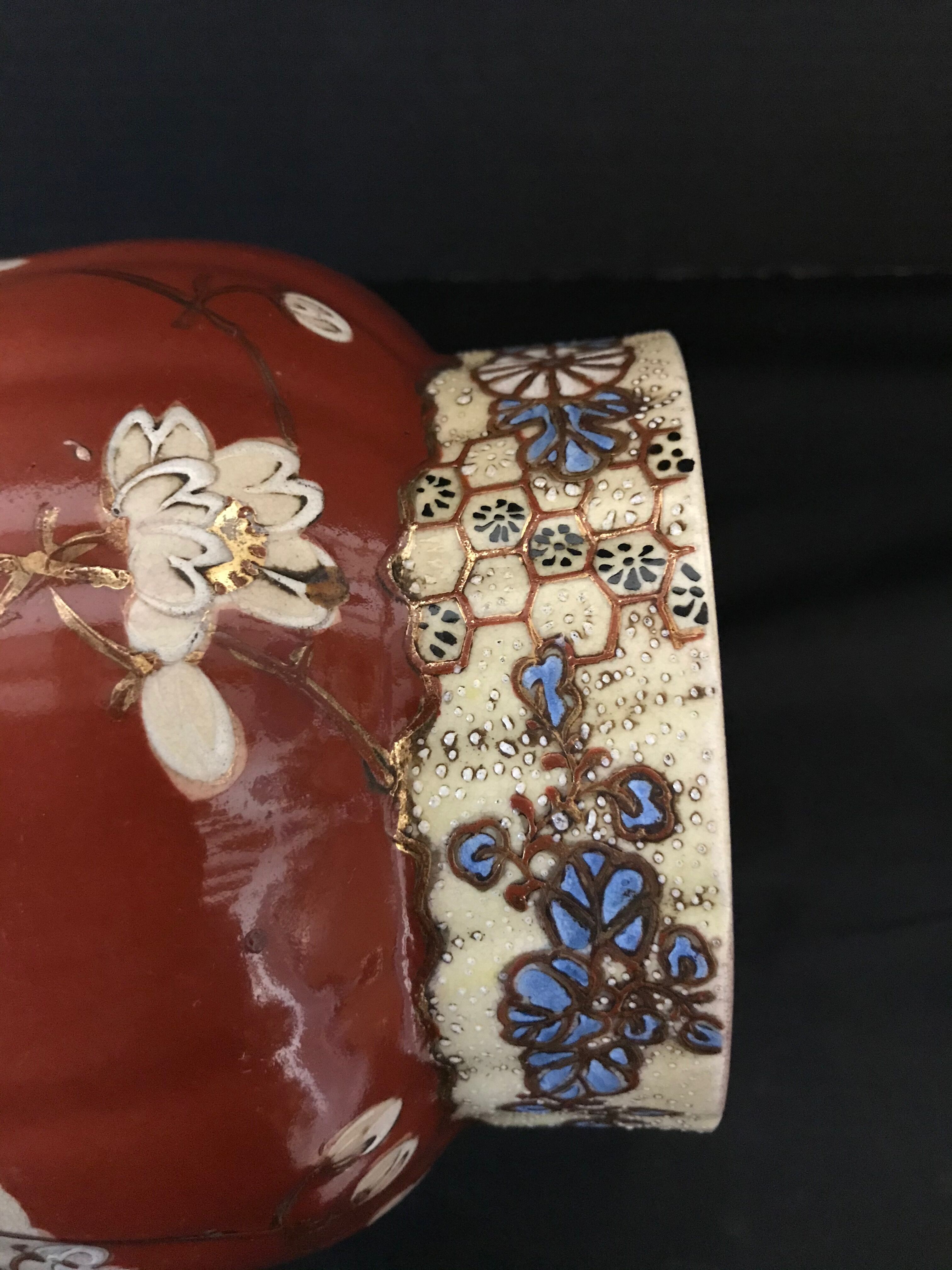 Vase - enamelled faïence with hand-painted gilding