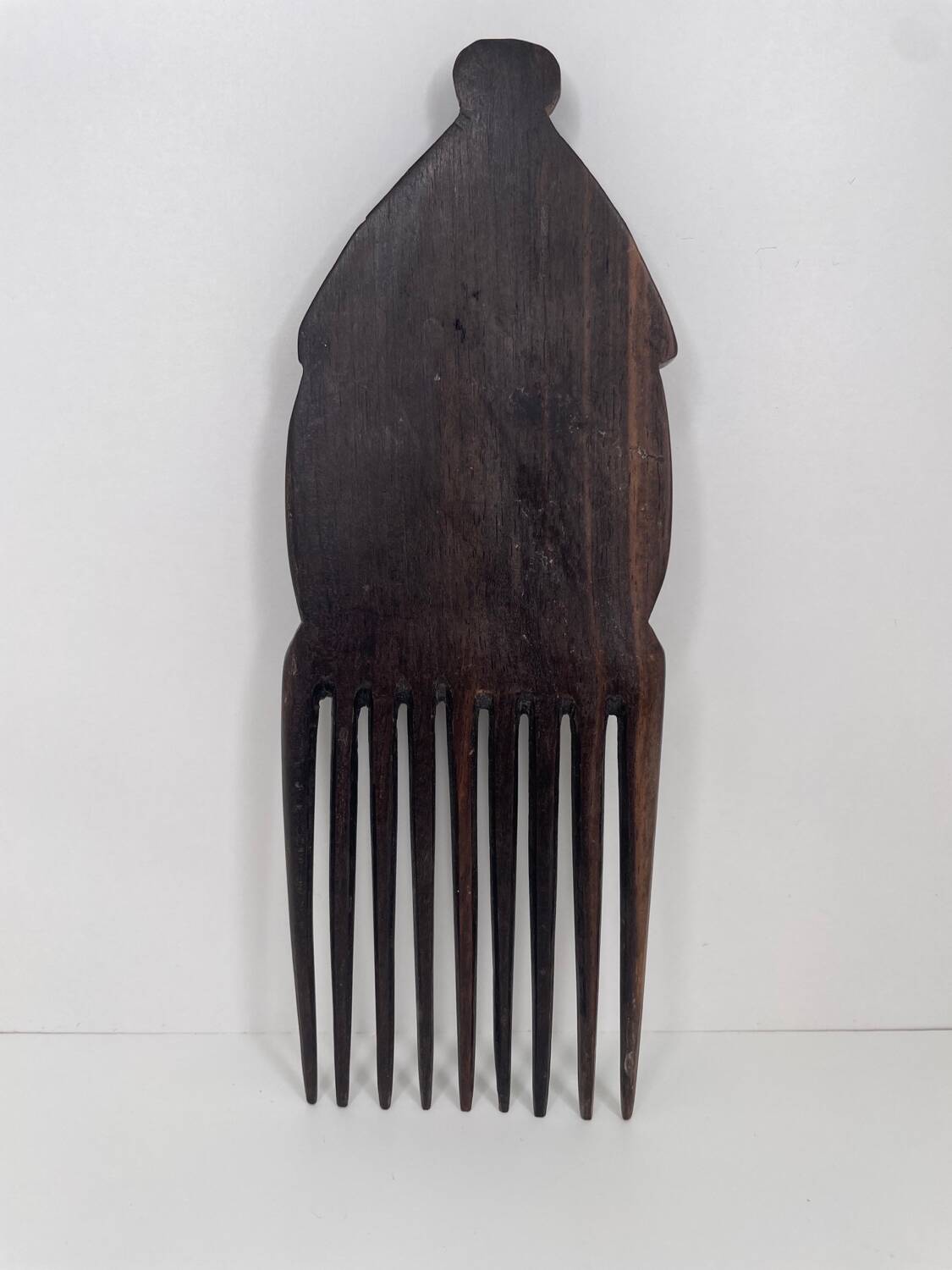 Old ethnic comb in exotic wood