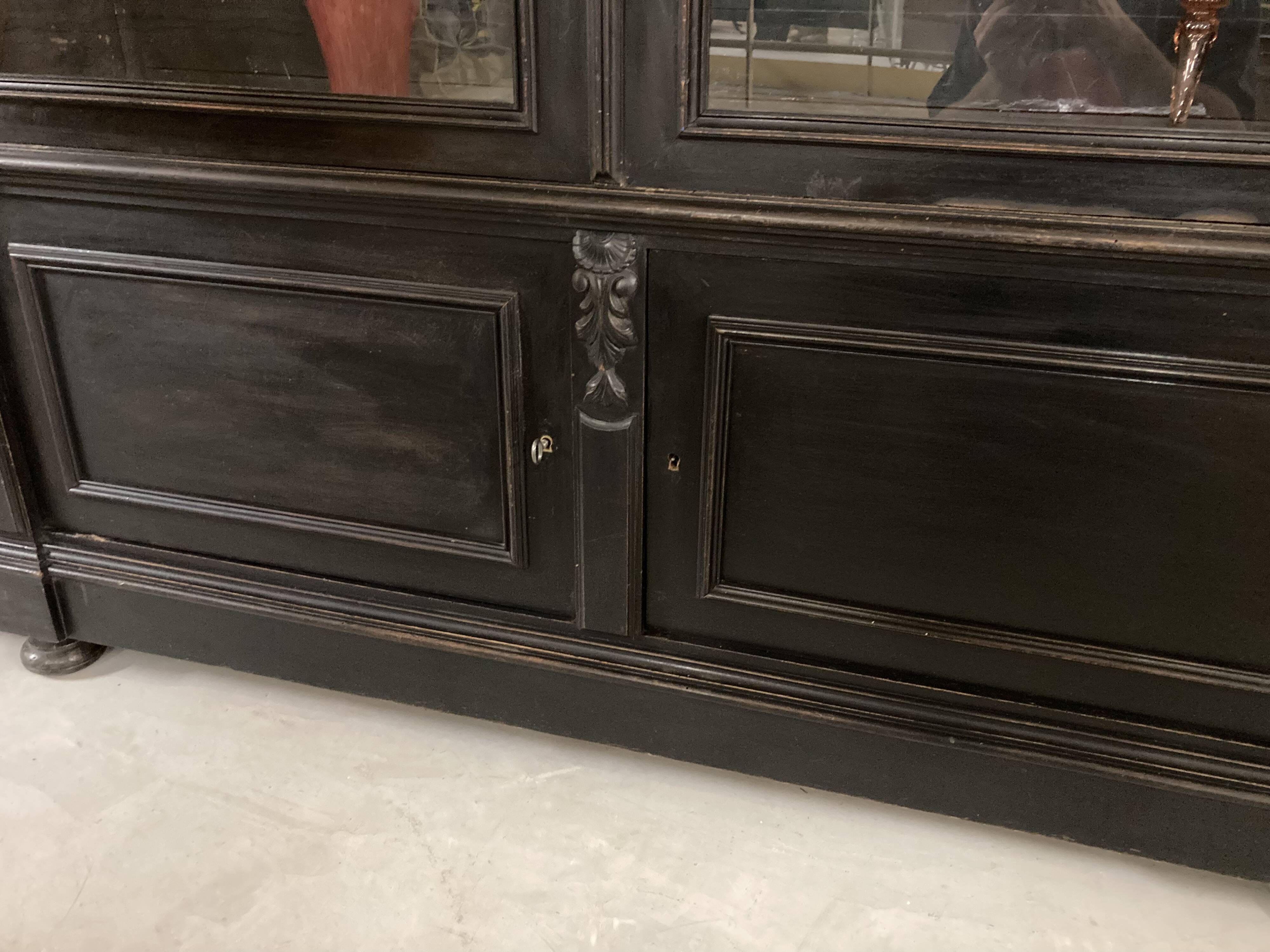 Library from the Napoléon III era in blackened pear wood.