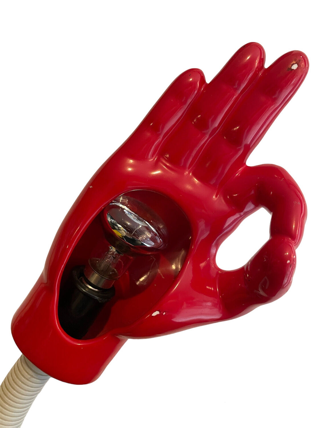 Articulated desk lamp in the shape of a vintage red and white hand