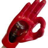 Articulated desk lamp in the shape of a vintage red and white hand
