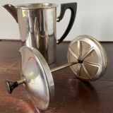 Old silver metal piston coffee maker