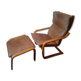 Fauteuil avec repose pied cuir Poem par Norboru Nakamura