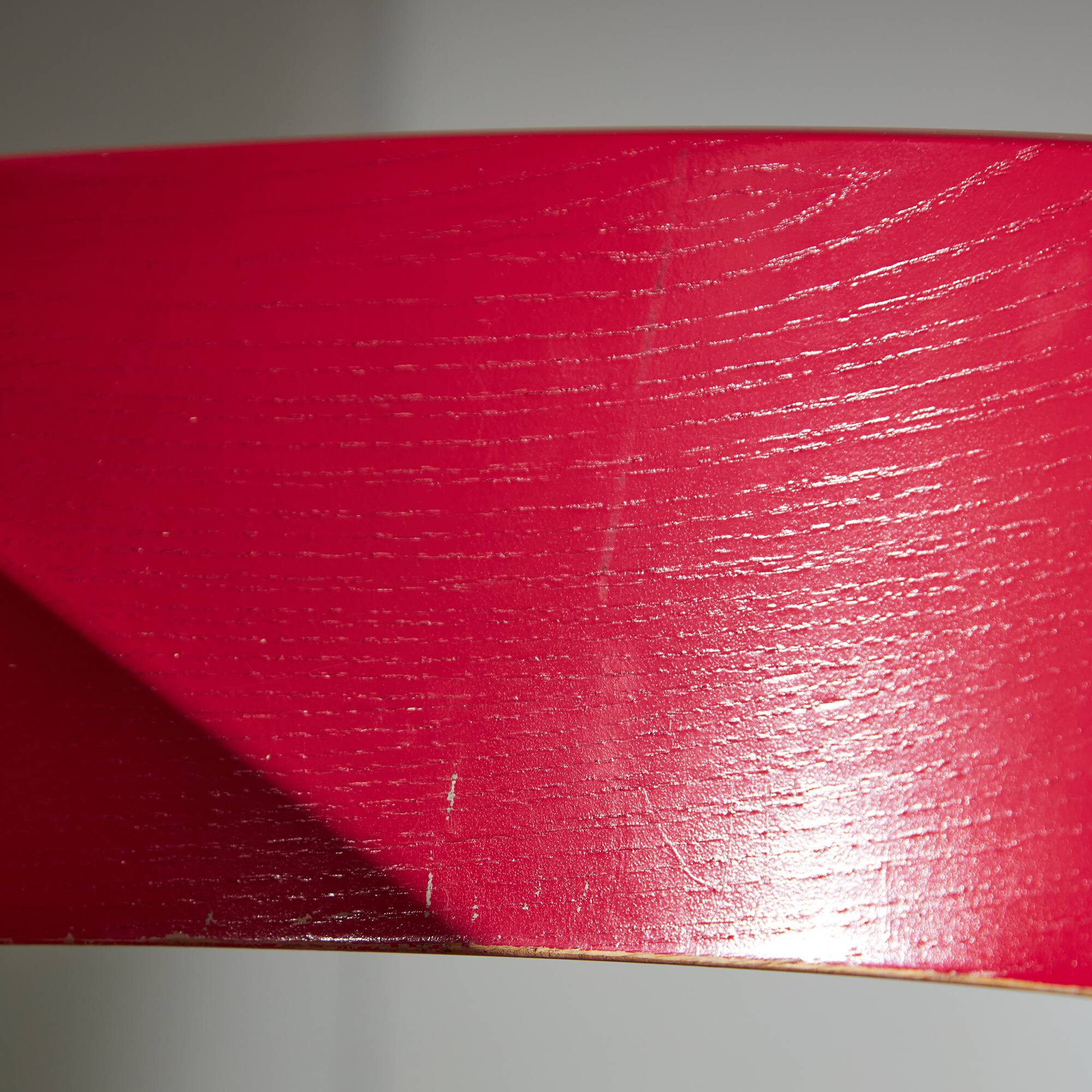 Red Plywood and Curved Metal Frame Chair