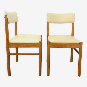 Pair of vintage Baumann wooden and skai chairs from the 70s