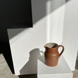Handmade stoneware pitcher below H: 20cm