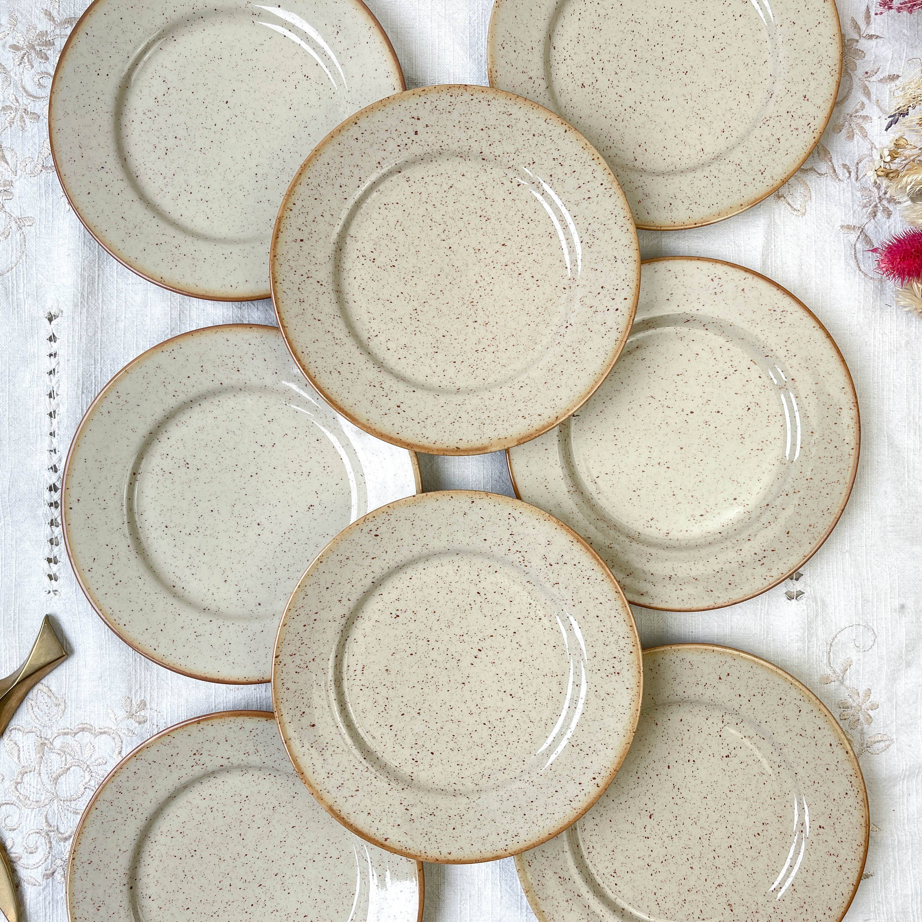 8 Small plates in speckled stoneware Tulowice mid century 20th