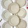 8 Small plates in speckled stoneware Tulowice mid century 20th