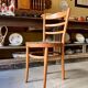 Baumann bistro chair in beech and orange and black geometric cotton