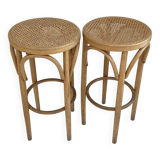 2 wooden and cane stools