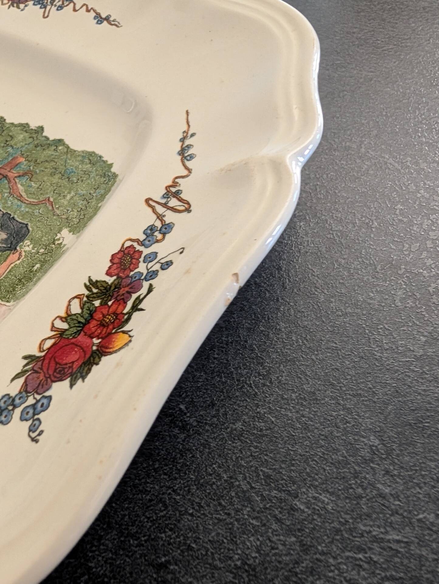 Two earthenware dishes from Obernai signed Henri Loux.