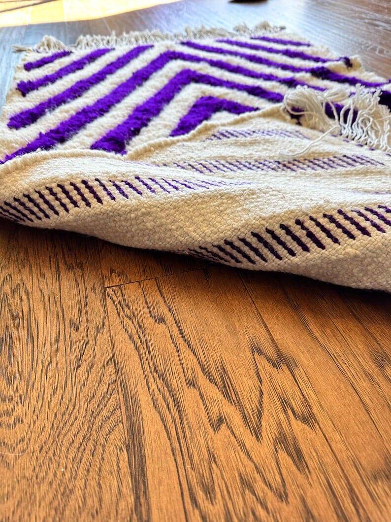 Handmade wool rug from Moroccan Atlas, size 140 x 260 cm.