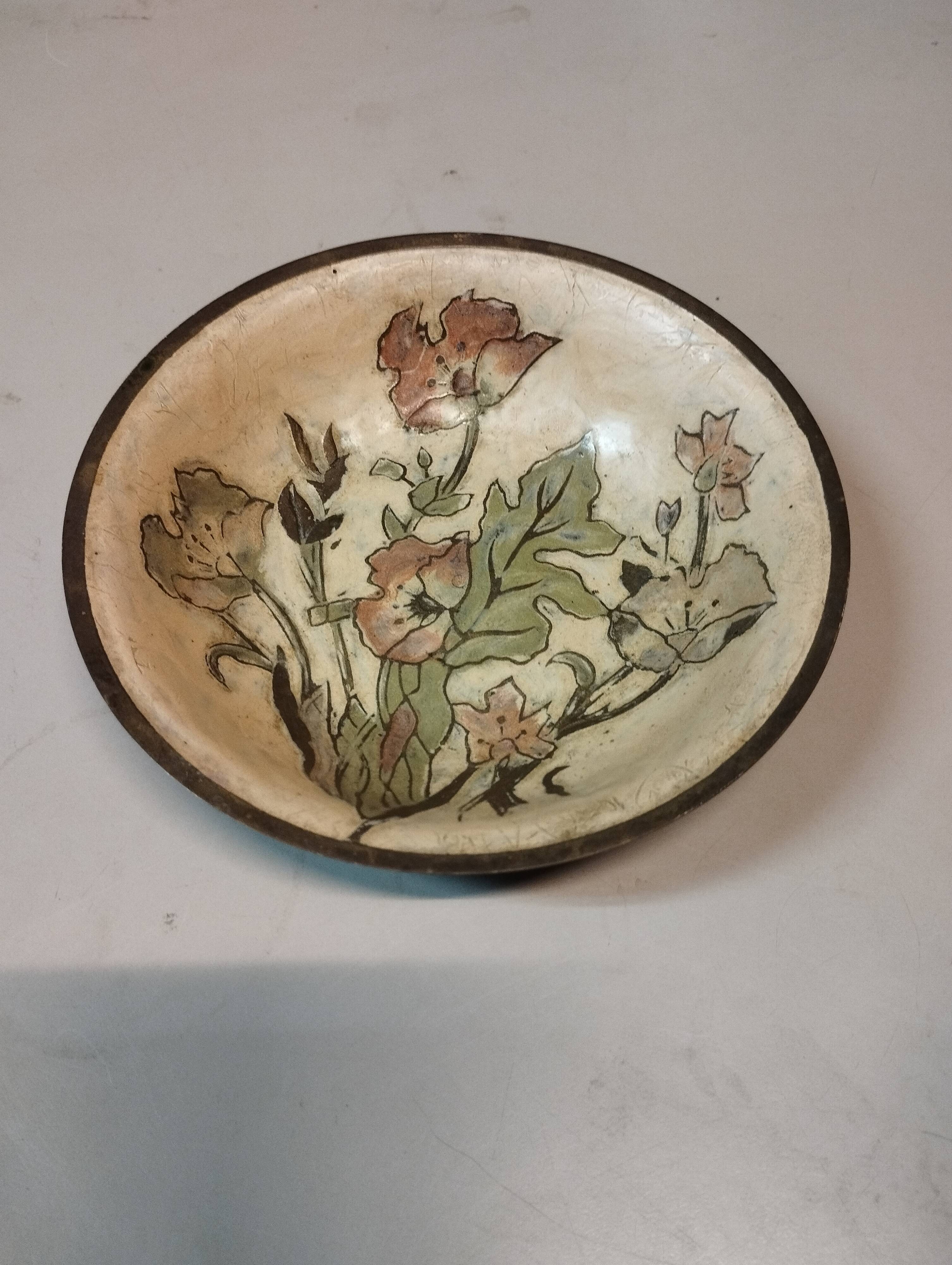 Cup with floral decoration