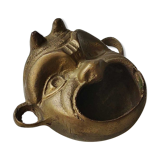 Ashtray/empty pocket devil's satyric head/diablotin, in bronze with golden patina. signed medina iran