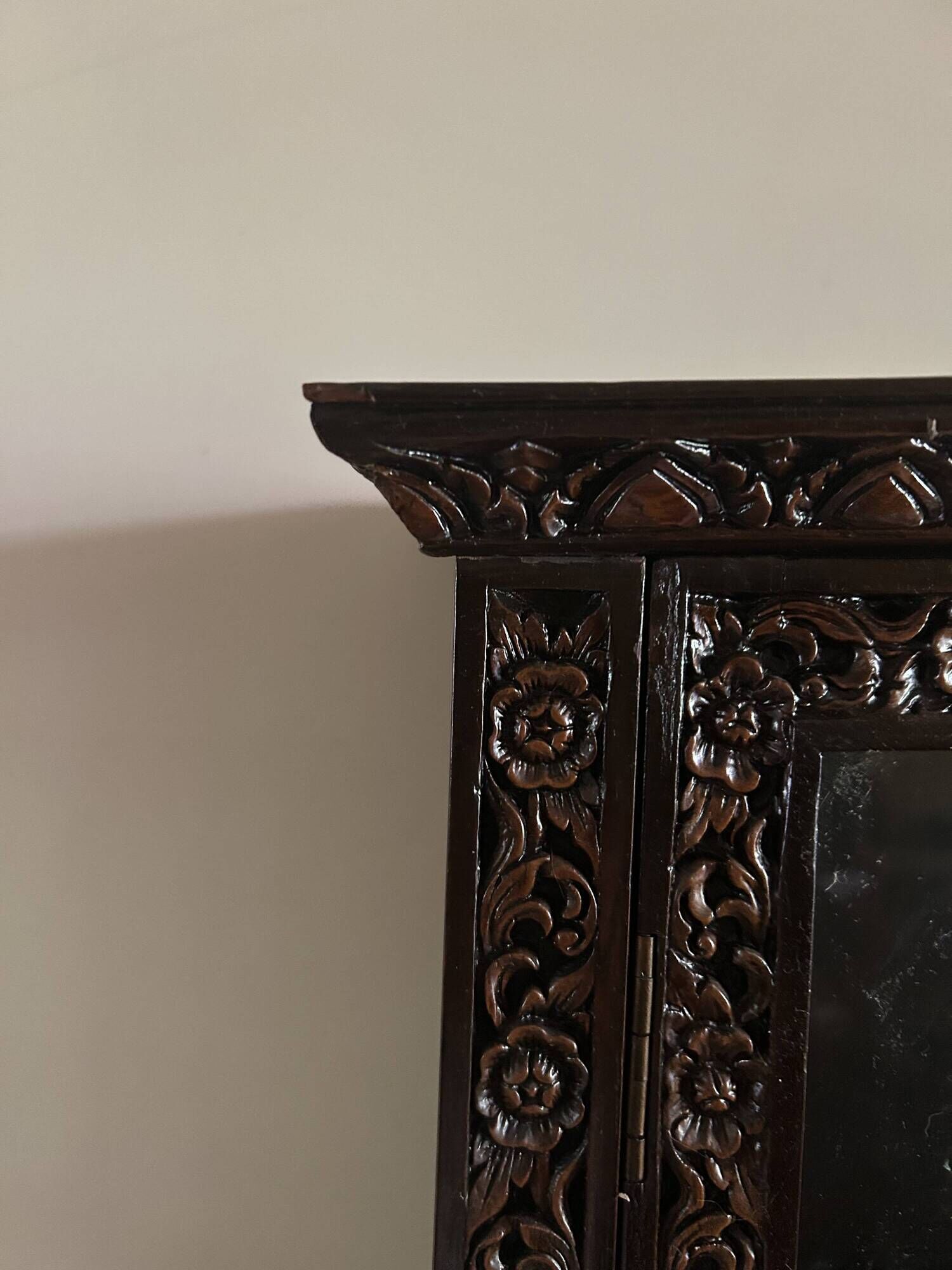 Thai trapezoidal display cabinet in carved solid wood