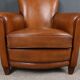 Paire de fauteuils club en cuir