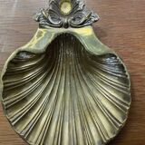 Empty shell pocket in vintage brass