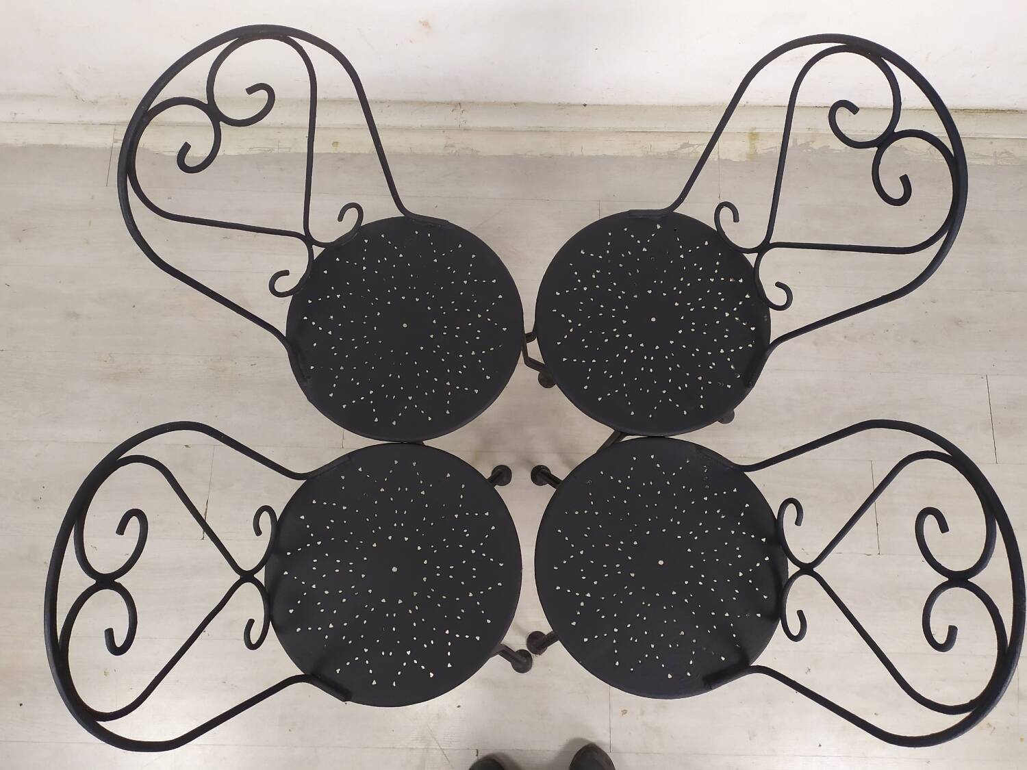 4 black garden chairs