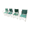 Four armchairs by Jacques Hitier