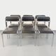 Set of 6 vintage Italian stackable chairs in chrome metal and faux leather.