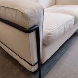 A sofa and two LC2 Cassina armchairs