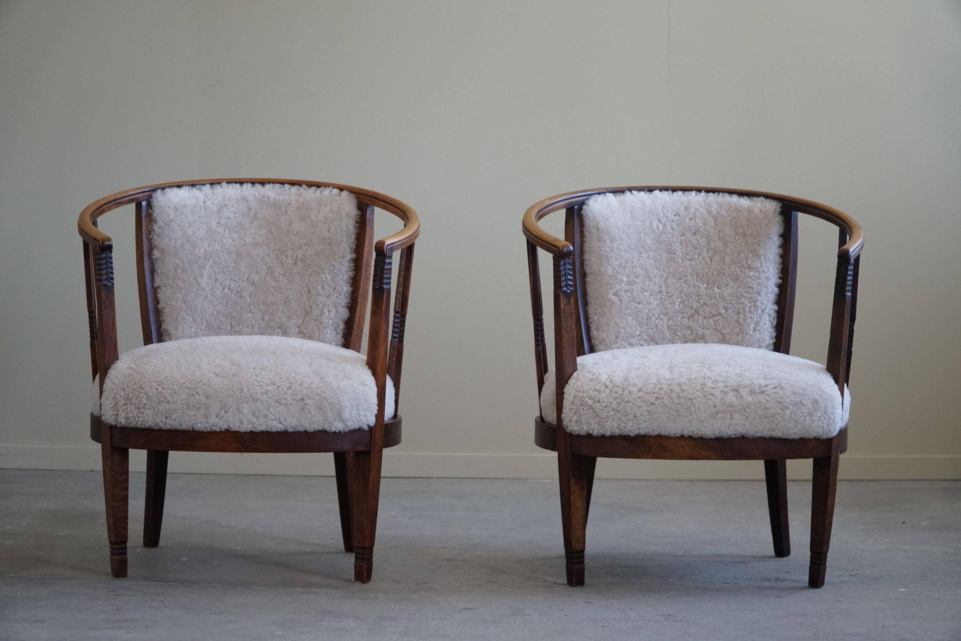 Pair of Danish armchairs in beech, reupholstered in lambswool, Art Nouveau, 1900s.