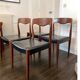 Set of 4 vintage designer chairs in teak and black skai 60's